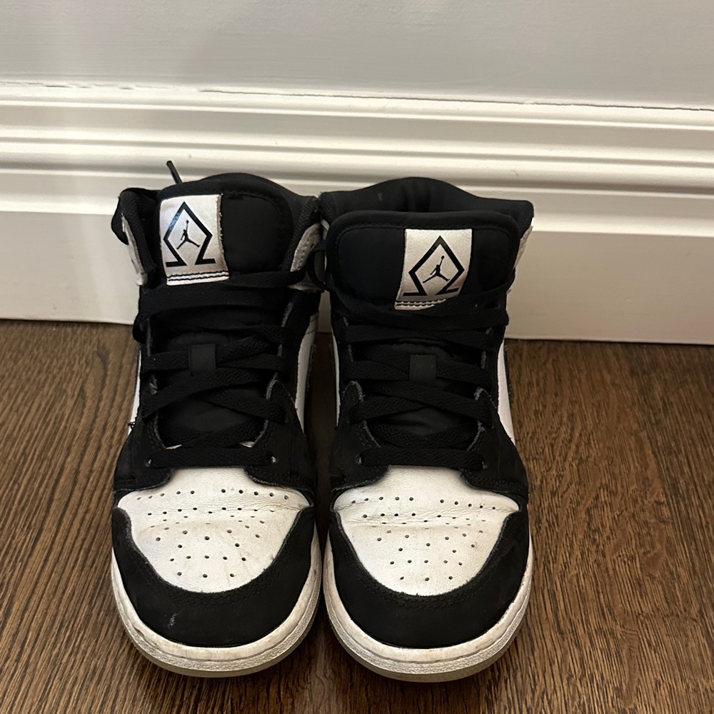 Jordan’s Black and White High-Top Sneakers